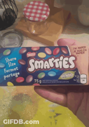 Someone Holding Box Of Smarties Candy GIF