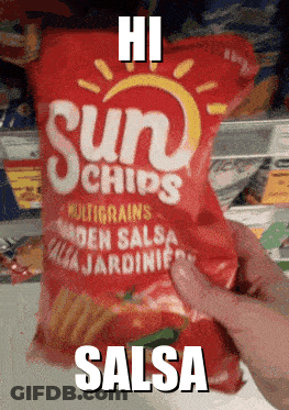 Someone Is Holding A Bag Of Sun Chips In Salsa GIF