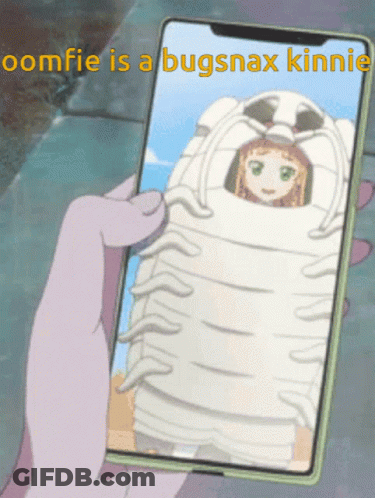 Someone Is Holding A Cell Phone With A Picture Of A Girl In A Bug Costume On It GIF