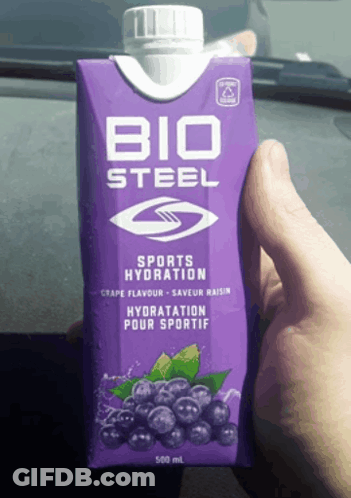 Someone Is Holding A Purple Box Of Bio Steel Sports Hydration GIF