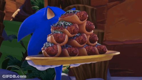 Sonic The Hedgehog Is Holding A Tray Of Hot Dogs With Jalapenos On Them GIF
