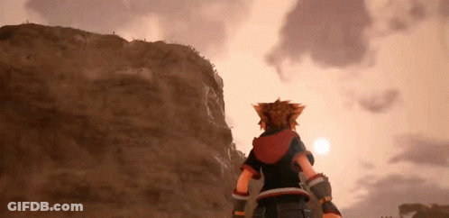 Sora From Kingdom Hearts 3 Is Standing On Top Of A Mountain Looking At The Sun . GIF