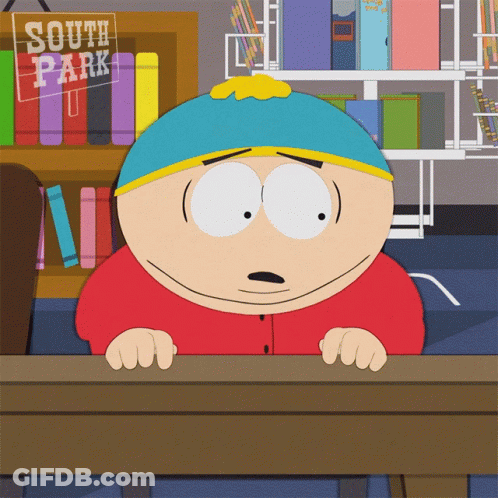 South Park Cartoon Character Sitting At Desk GIF