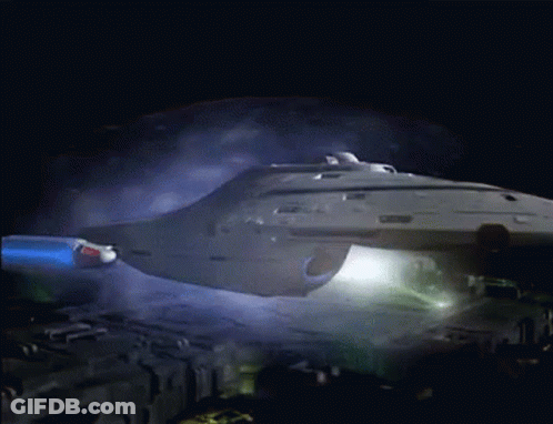 Space Ship Flying In Dark With Smoke GIF