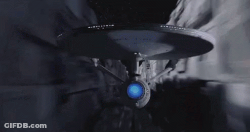Space Ship Flying With Beam Of Light GIF