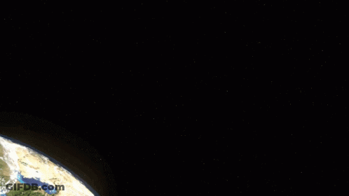 Spaceships Flying Over Planet GIF