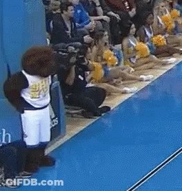 Spartan Cheerleader Held By Man GIF