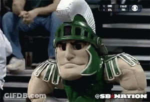 Spartan Mascot Sitting On Bleacher In Front Of CBS Logo GIF