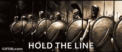 Spartan Soldiers With Shields And Spears Hold The Line GIF