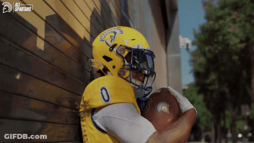 Spartans Football Player Holding Football GIF