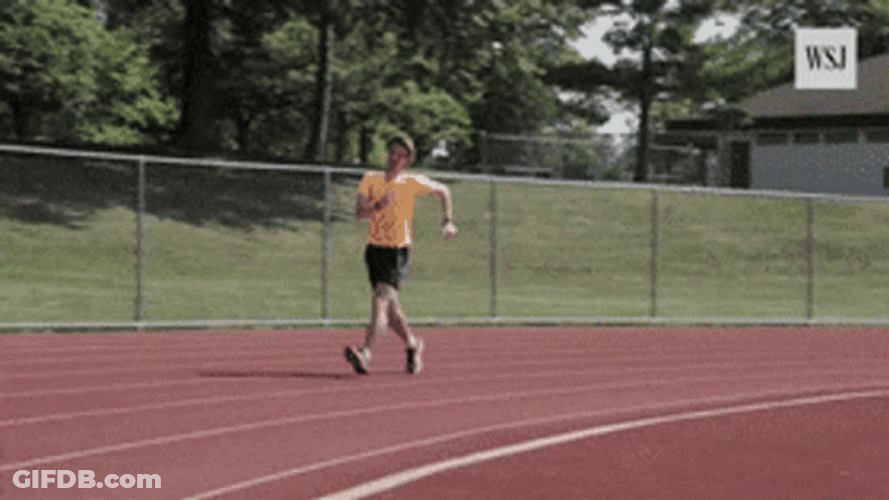 Speed Walking Man In Orange Shirt GIF