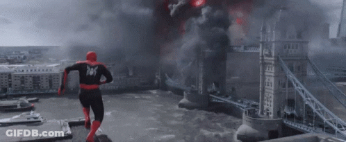 Spider-Man Is Flying Through The Air With His Arms Outstretched In A Cloudy Sky . GIF