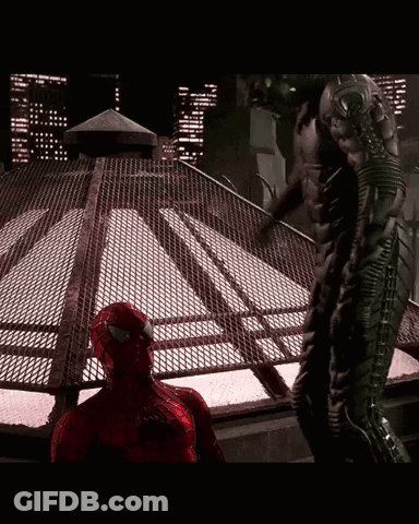 Spiderman Costume Man Next To Black Suit Man GIF