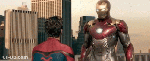 Spiderman Costume Standing Next To Iron Man Suit GIF