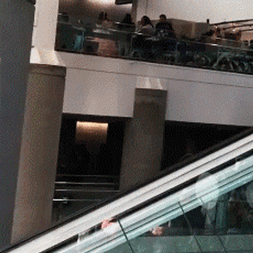 Spiderman Dancing Cosplayer At Escalator GIF