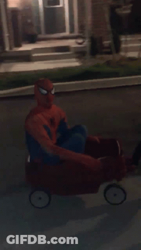 Spiderman Lying On Sidewalk GIF