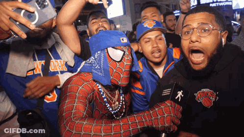 Spiderman Surrounded By New York Knicks Fans GIF