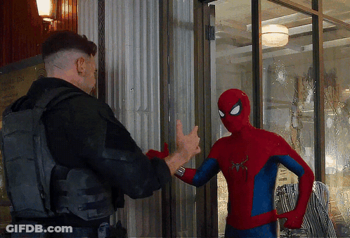 Spiderman Talking To Man In Black Vest GIF