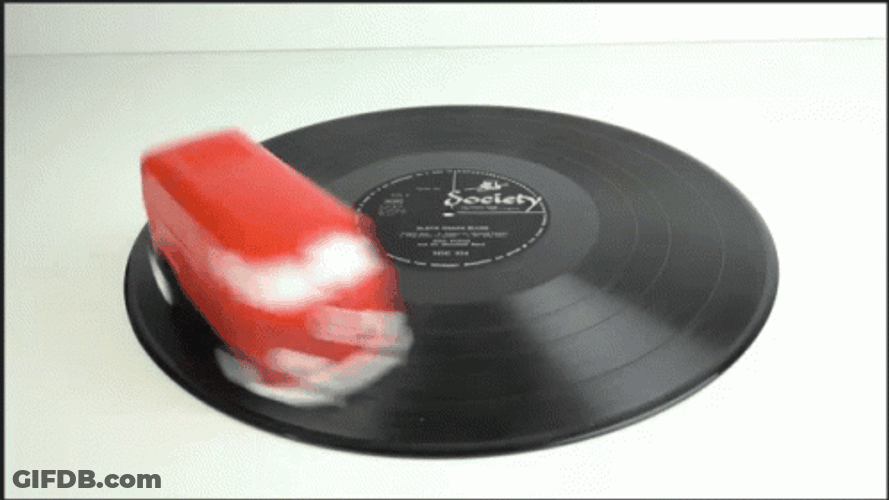 Spinning Bus Toy On Broken Record GIF