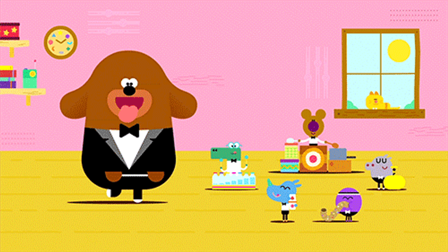 Spinning Dog Wearing Tuxedo GIF