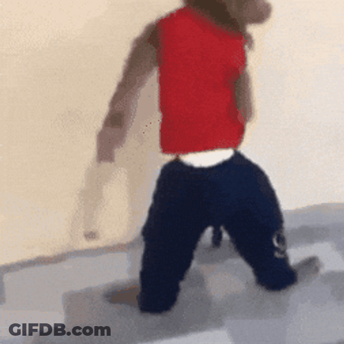 Spinning Monkey Wearing Human Clothings GIF