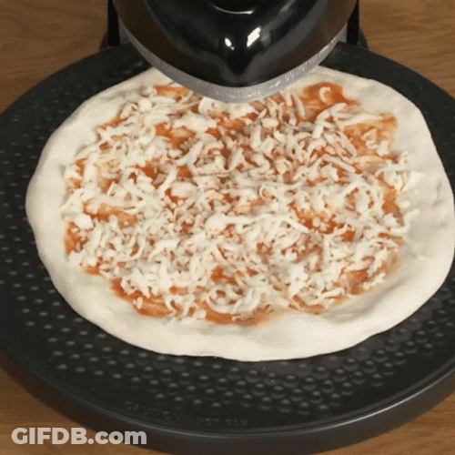 Spinning Pizza On Cheese Machine GIF