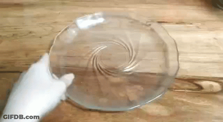 Spinning Plate Slowly With Hand GIF