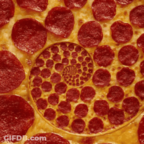 Spiral Spinning Peperoni Pizza GIF