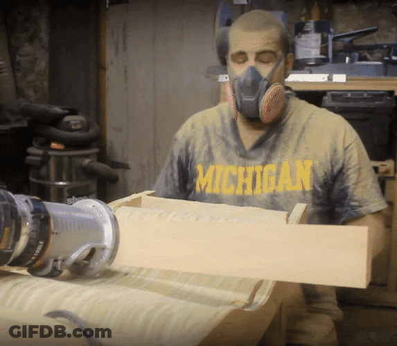 Spitting Out Wood Sawdust GIF