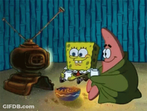 Spongebob And Patrick Playing Video Game With Bowl Of Cereal GIF