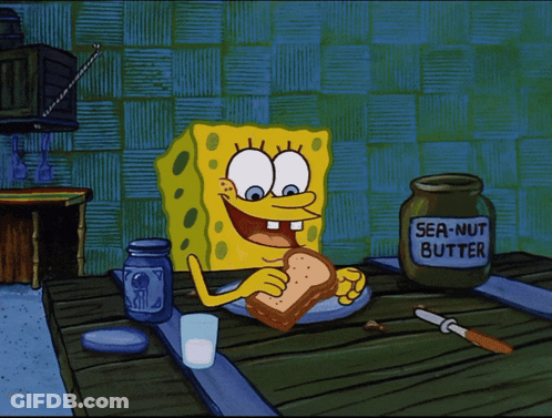 SpongeBob Eating Sandwich Next To Jar Of Peanut Butter GIF