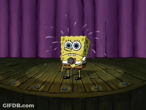 SpongeBob Holding Microphone On Stage GIF