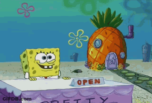 Spongebob Is Standing Behind A Table That Says Open GIF