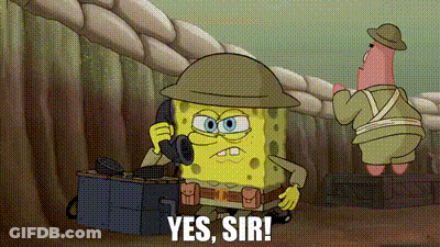 Spongebob Is Wearing A Helmet And Talking On A Cell Phone While Patrick Stands Behind Him . GIF