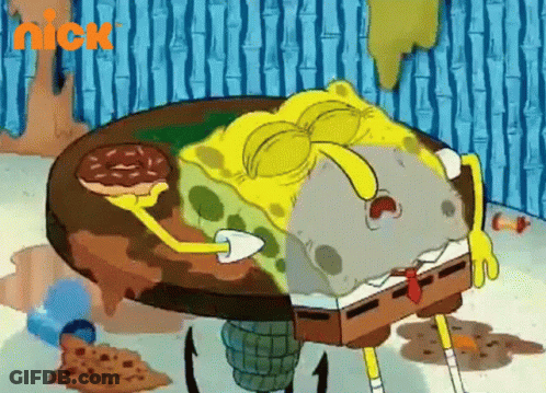 SpongeBob Laying On Table With Donut And Nick Logo GIF