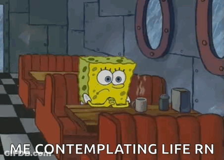 SpongeBob Sitting At Diner Table With Coffee GIF