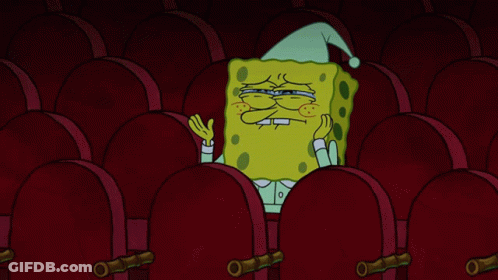 SpongeBob Sitting In Theater With Red Seats GIF