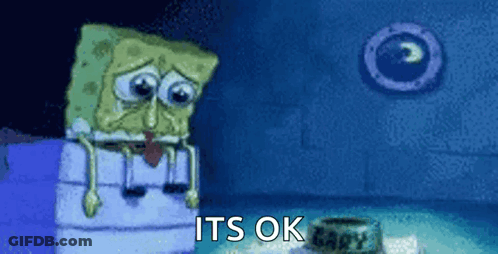 Spongebob Sitting On Box In Dark Room GIF