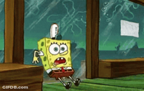 SpongeBob Sitting On Floor Looking Out Window GIF