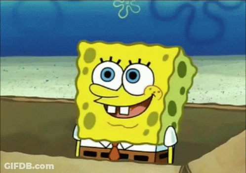SpongeBob Smiling In Sand GIF