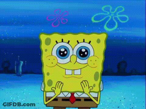 Spongebob Squarepants Is Sitting On A Table With His Hands Folded In Front Of Him . GIF