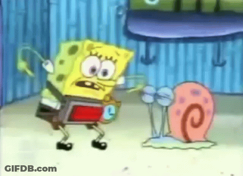 Spongebob Squarepants Is Standing Next To A Snail . GIF