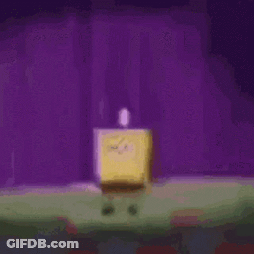 Spongebob Squarepants Is Standing On A Stage With A Purple Curtain Behind Him . GIF
