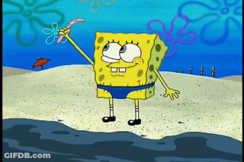 Spongebob Squarepants Is Standing On The Beach Holding A Worm In His Hand . GIF