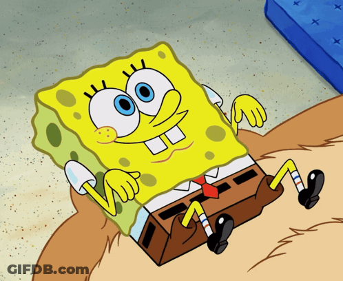 Spongebob Squarepants Laying On Sandy Beach GIF