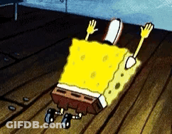 Spongebob Squarepants Laying On Wooden Floor With Hands Up GIF