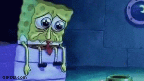 Spongebob Squarepants Sitting On Barrel In Dark Room GIF