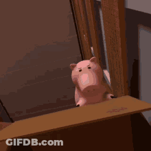 SpongeBob Standing In Front Of Door With Facebook Logo GIF