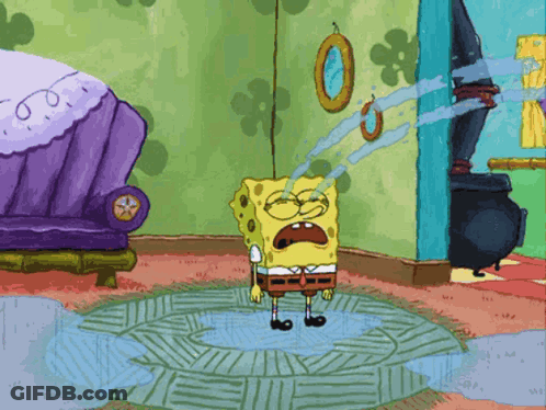 SpongeBob Standing In Room With Purple Couch GIF