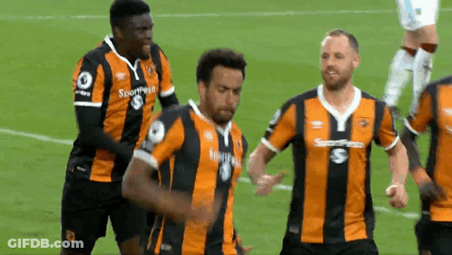 Sportpesa Soccer Players Orange And Black Striped Jerseys GIF